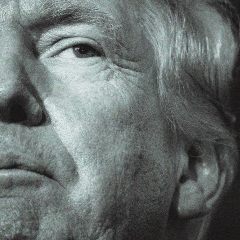 An extreme close up of Donald Trump and a bar of text that reads "Trump 2.0 Year One"