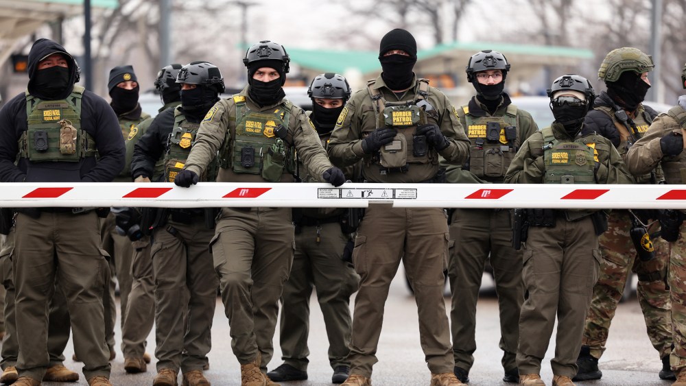 US Border Patrol agents stand guard on Jan. 8, 2026 in Minneapolis.