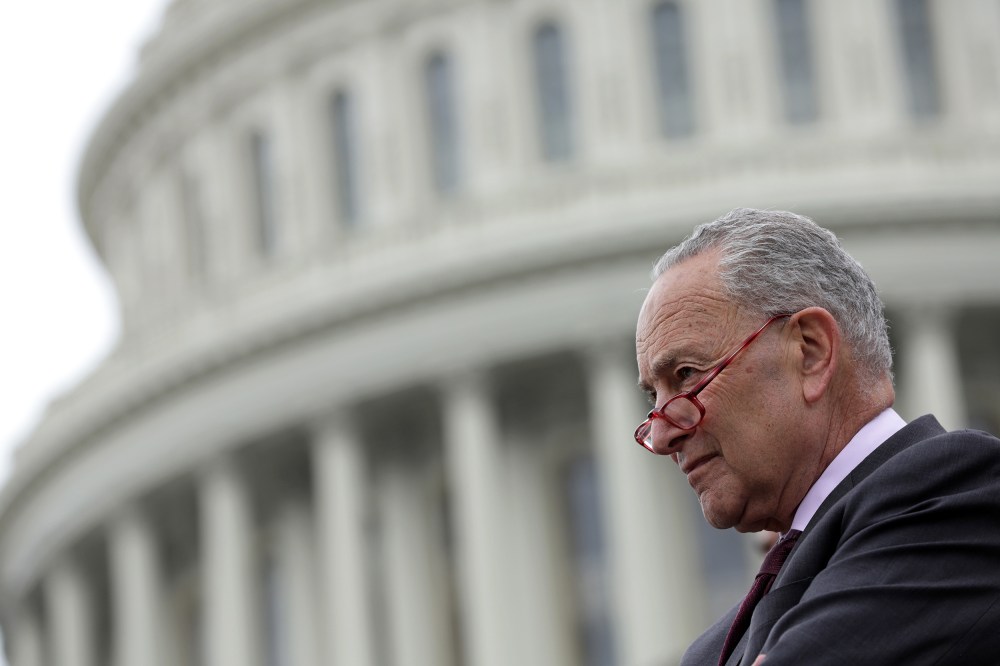 Chuck Schumer, with the Capitol blurred in the background.