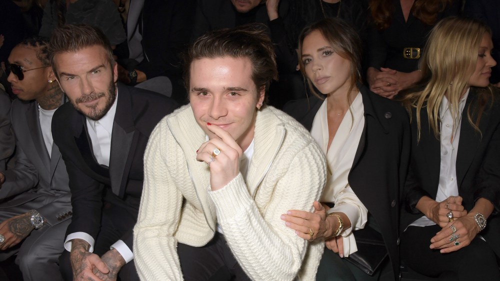 From left, David Beckham, Brooklyn Beckham and Victoria Beckham.