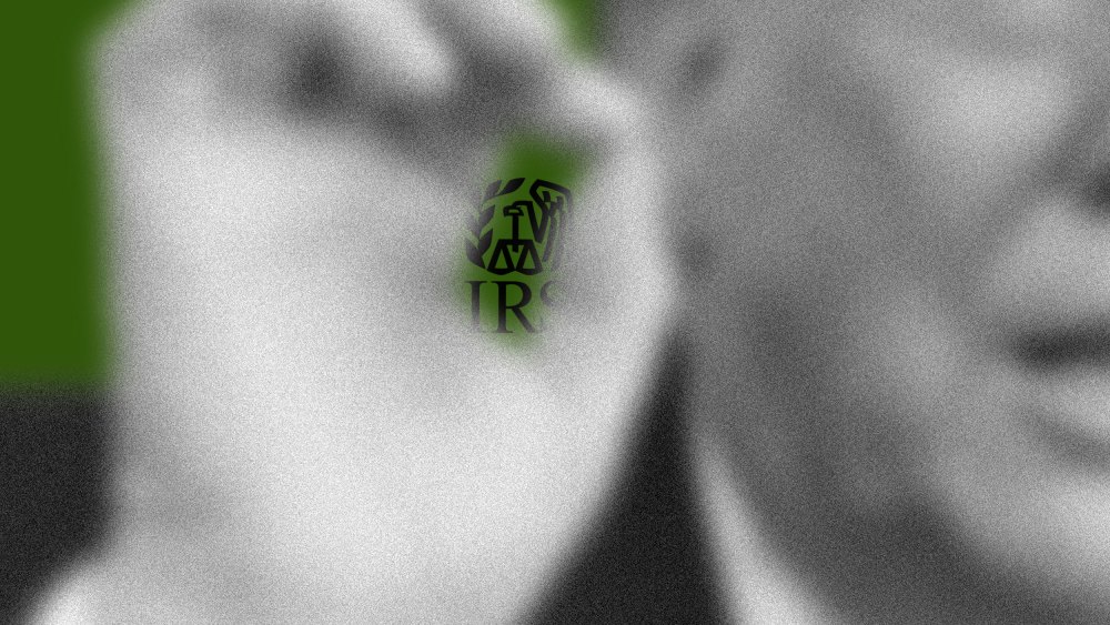 A photo illustration showing the IRS logo behind Trump's pinched fingers