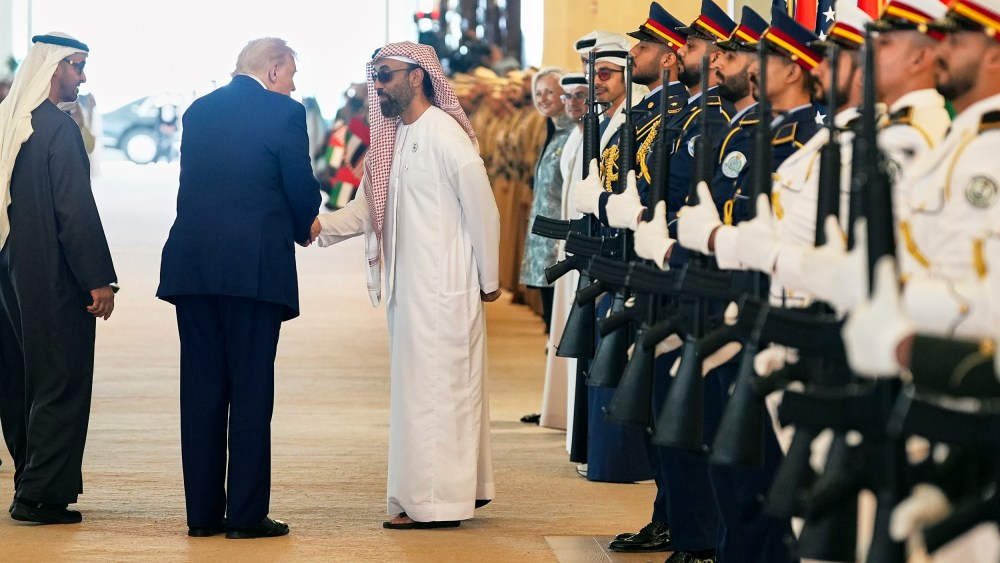 President Donald Trump shakes hands with Tahnoon bin Zayed Al Nahyan, national security adviser of UAE.