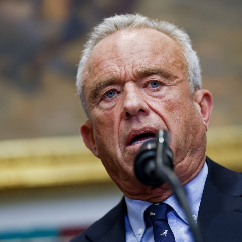 A close-up of Robert F. Kennedy Jr. speaking into a microphone.