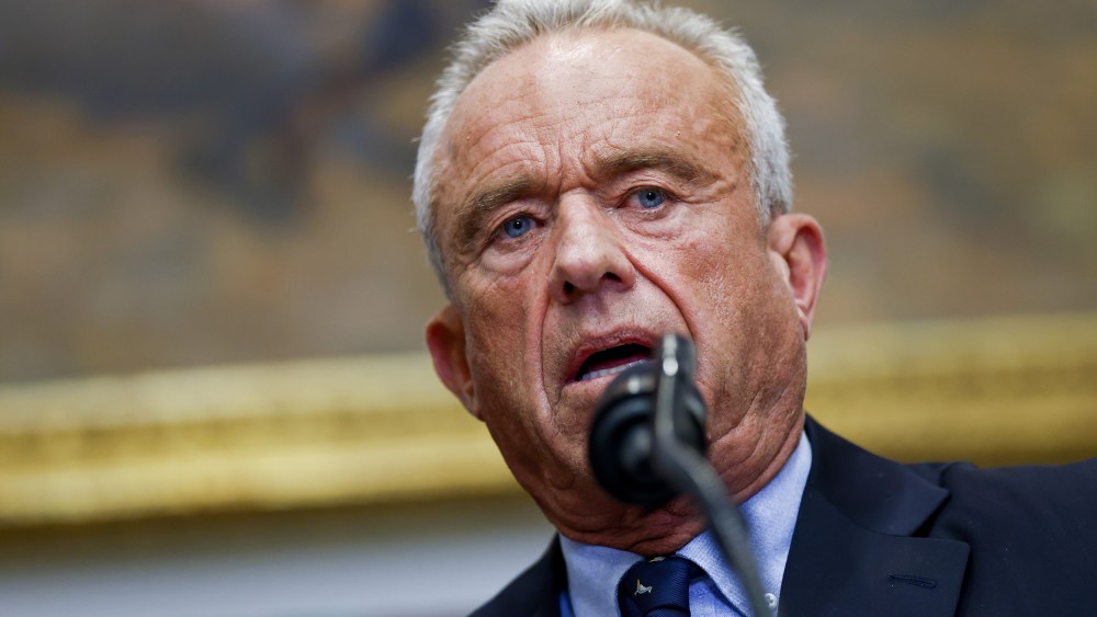 A close-up of Robert F. Kennedy Jr. speaking into a microphone.