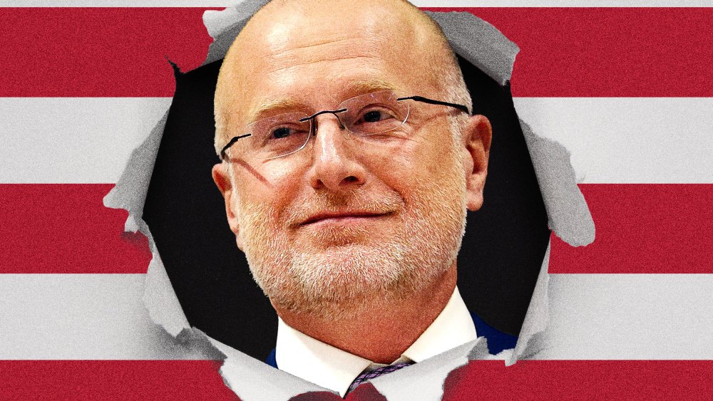Photoillustration of Brendan Carr popping his head out of an American flag.