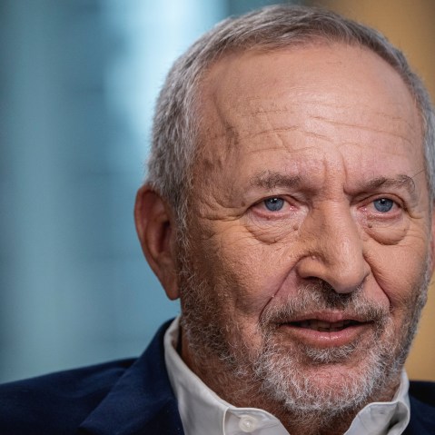 Larry Summers face is seen in a very closeup shot.