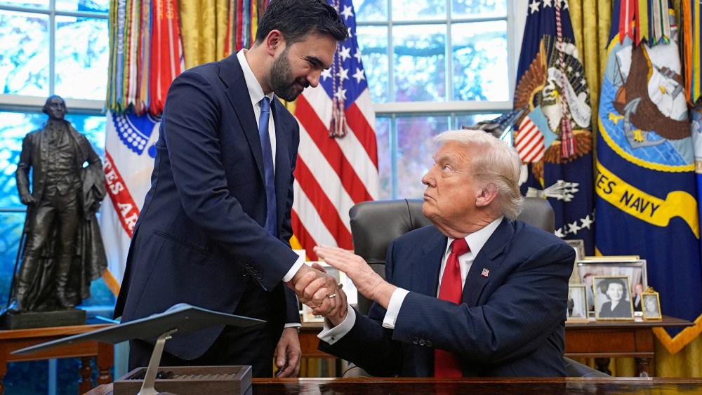 Zohran Mamdani, left, and Donald Trump shake hands in the Oval Office.