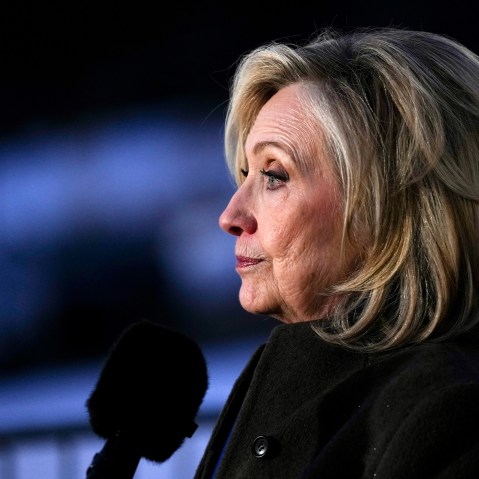Hillary Clinton is seen from the side as she speaks to the press in this closeup shot.