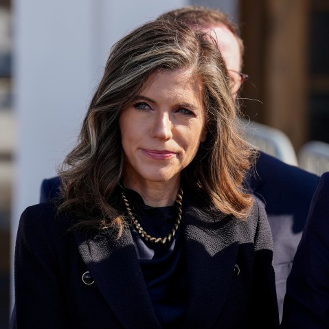 Nancy Mace is standing among other politicians outside.