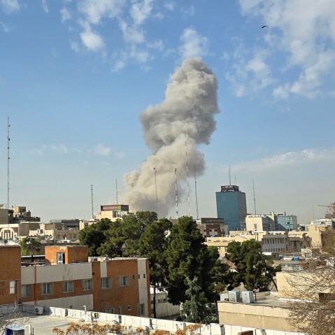 Smoke billows from an explosion in Iran