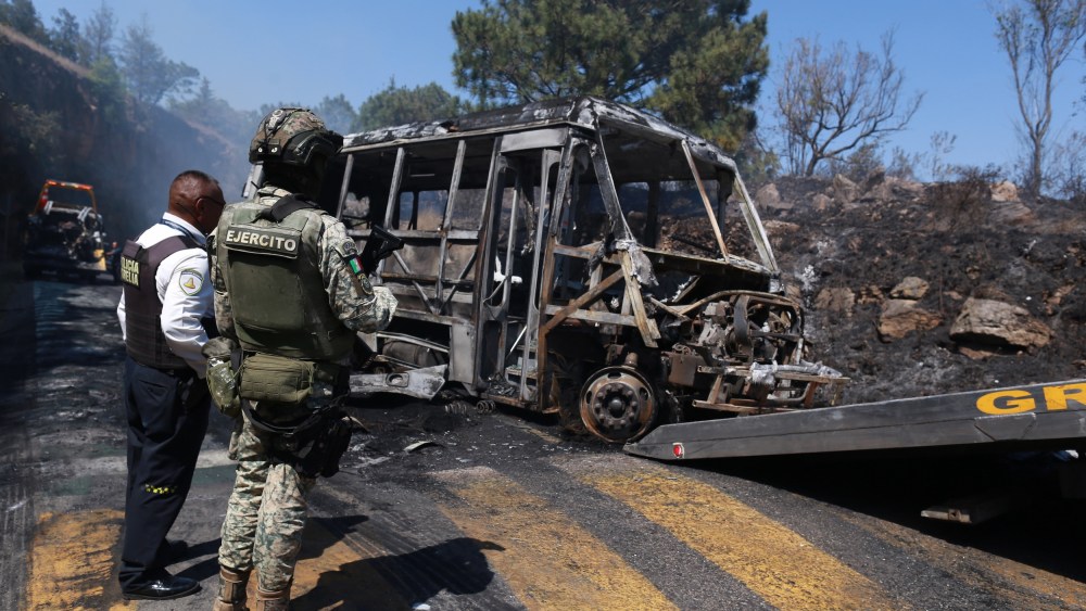 A soldier stands guard in Cointzio, Mexico
