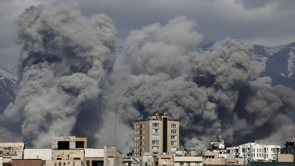 Smoke rises over Tehran, Iran, after a series of explosions on March 01, 2026.