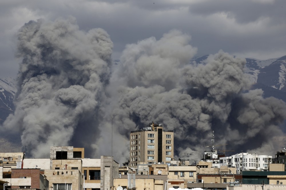 Smoke rises over Tehran, Iran, after a series of explosions on March 01, 2026.