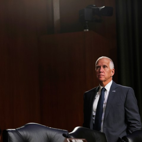 Thom Tillis stands.