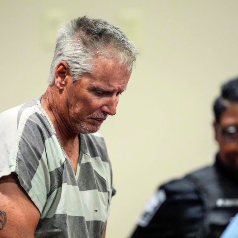 Colin Gray, 54, the father of Apalachee High School shooting suspect Colt Gray, 14, enters the Barrow County courthouse for his first appearance.