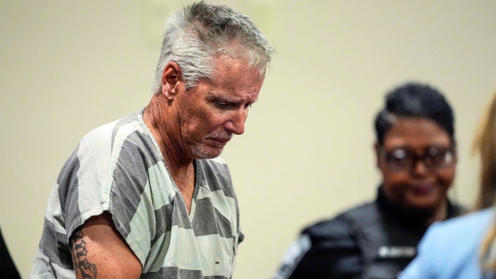 Colin Gray, 54, the father of Apalachee High School shooting suspect Colt Gray, 14, enters the Barrow County courthouse for his first appearance.
