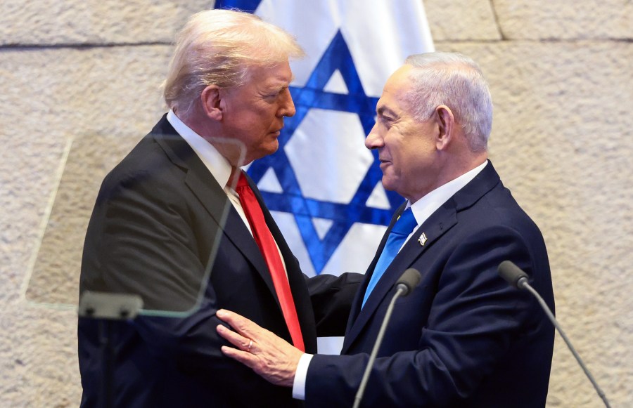 President Donald Trump speaks with Israeli Prime Minister Benjamin Netanyahu on Oct. 13, 2025 in Jerusalem.