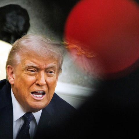 President Donald Trump speaks during a meeting.