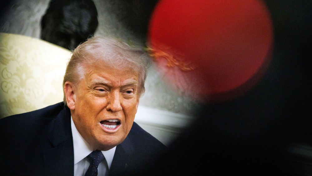 President Donald Trump speaks during a meeting.