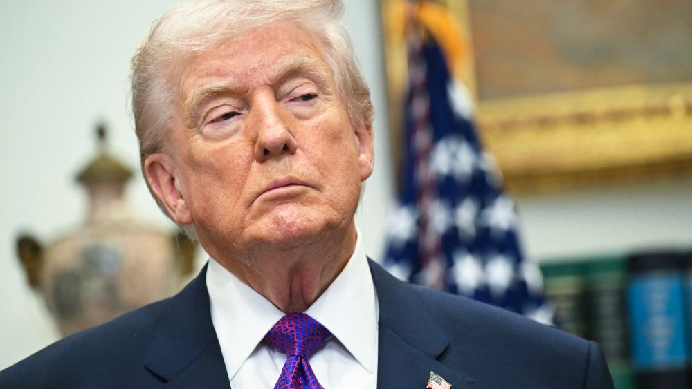 President Donald Trump looks on in the Roosevelt Room of the White House.