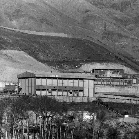 Evin Prison is seen on the outskirts of mountains.