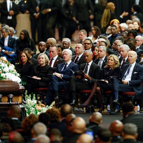 Politicians sit around the casket of Jesse Jackson during his funeral.