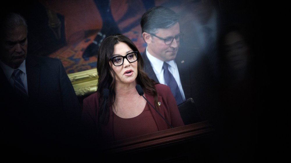 Lori Chavez-DeRemer is surrounded with Republican leaders in a frame partly obscured by a black mark.